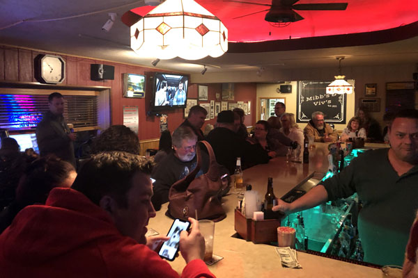 Picture of people inside the bar